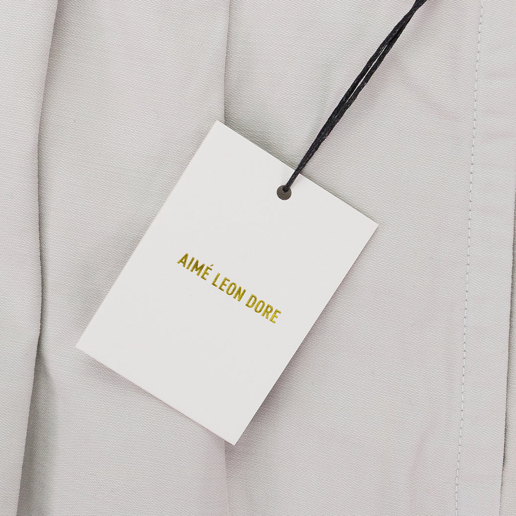 OFF-WHITE DOUBLE PLEATED TROUSERS