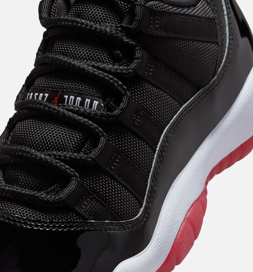 Air Jordan 11 Retro Bred – Grade School Lifestyle Shoe in Black/Varsity Red/White
